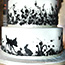 Hand painted black silhouette with sugar flowers