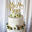 Fresh flowers and personalised cake topper