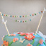 Sugar crafted bunting cake topper
